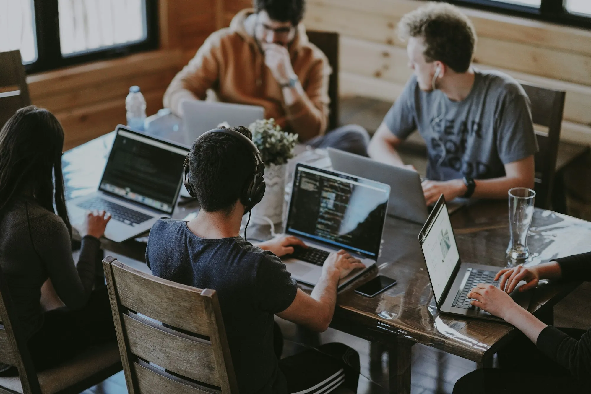 Team of developers collaborating in a modern office workspace